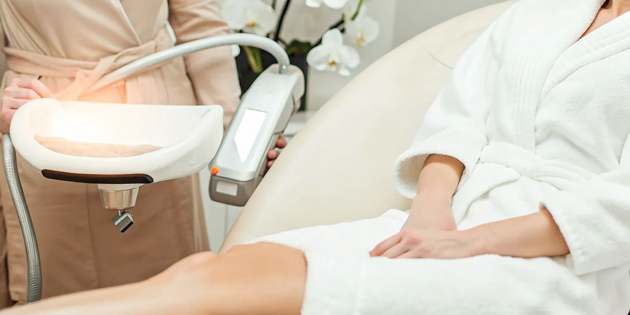 Woman at a Dallas medspa receiving an IPL photofacial for skin rejuvenation.