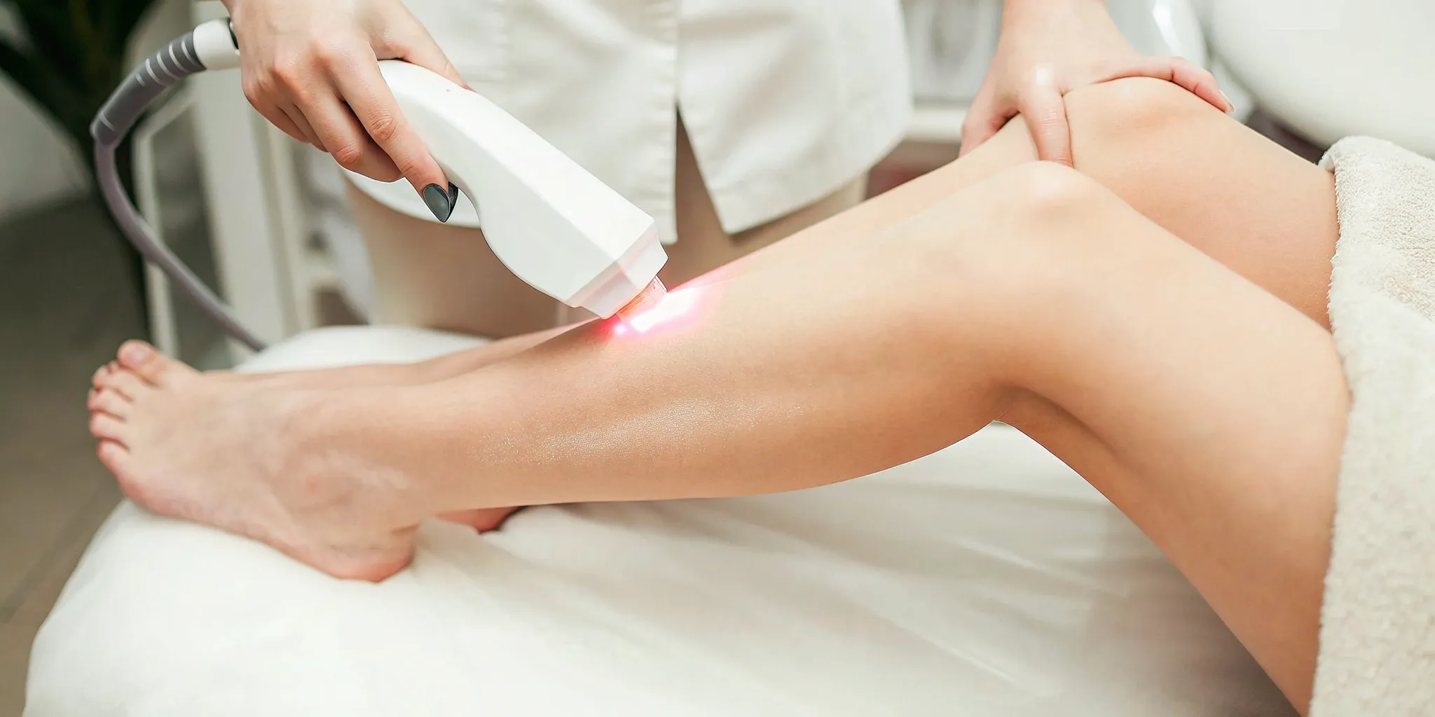 Laser tattoo removal treatment on a lower leg at a professional clinic in Plano.
