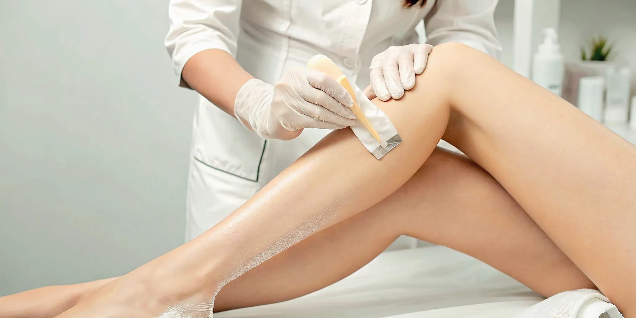 Woman receiving a professional Brazilian laser hair removal treatment.