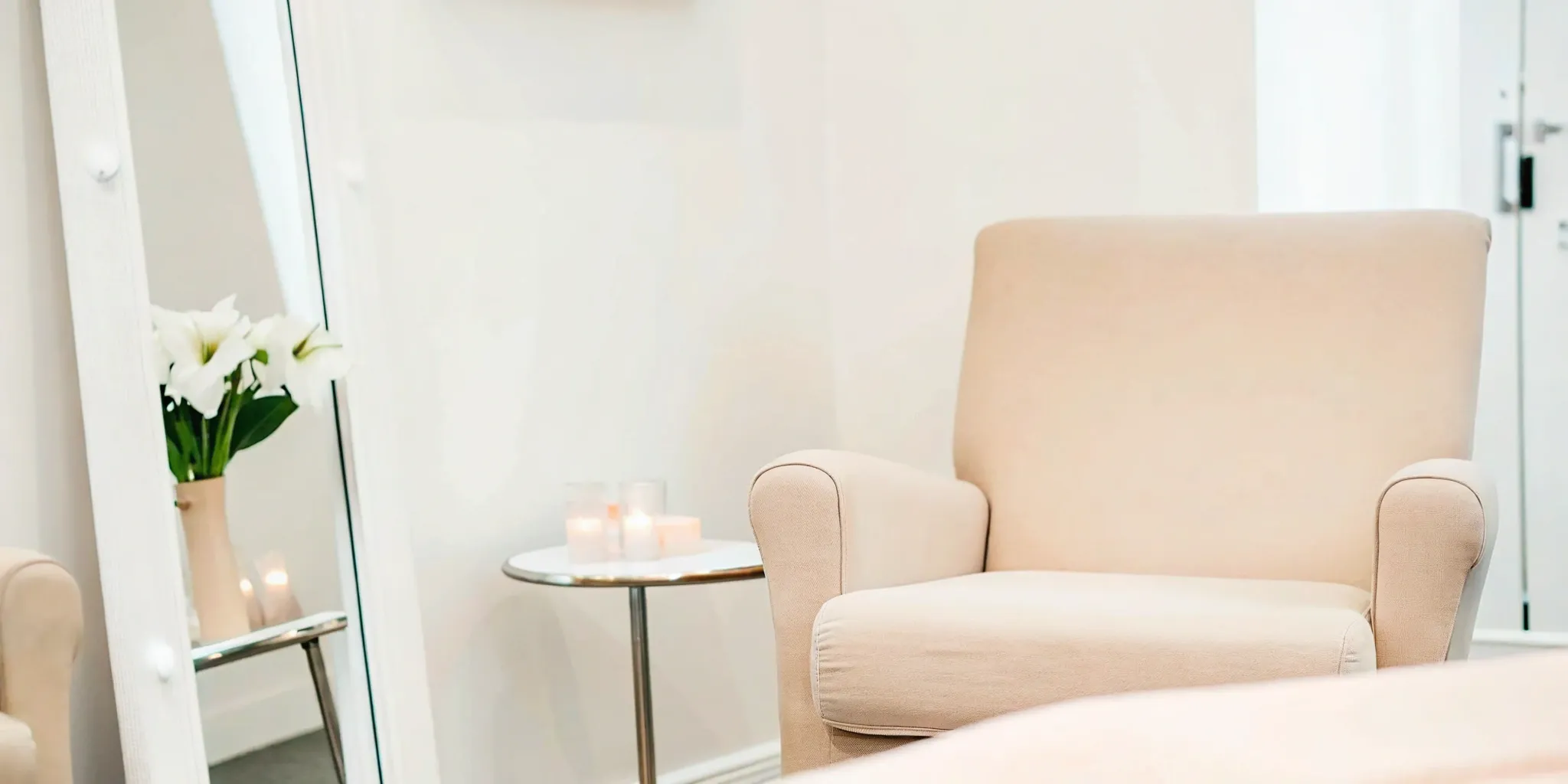 Woman receives Botox consultation in serene setting.