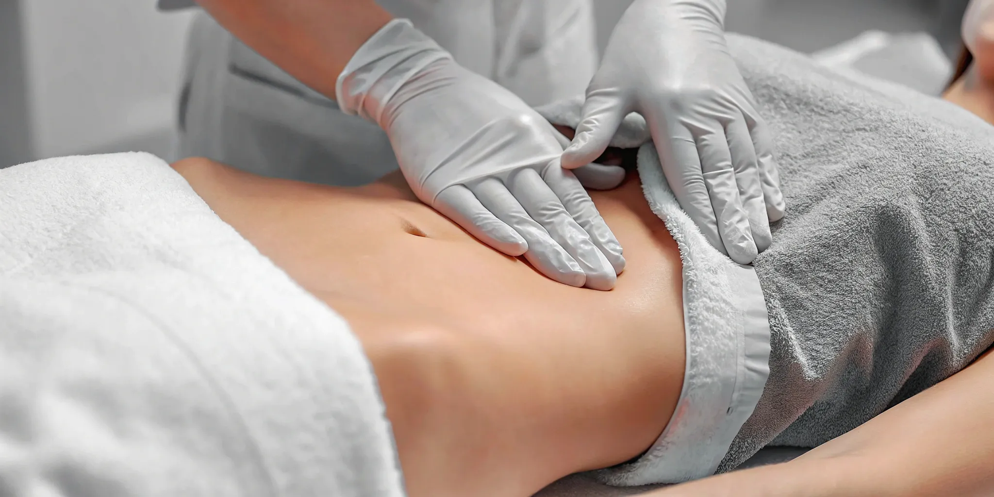 Smooth, toned abdomen after liposuction and skin tightening procedure.