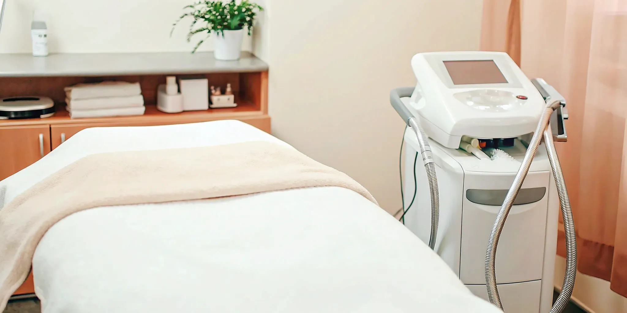 A professional treatment room for laser hair removal in Lewisville.