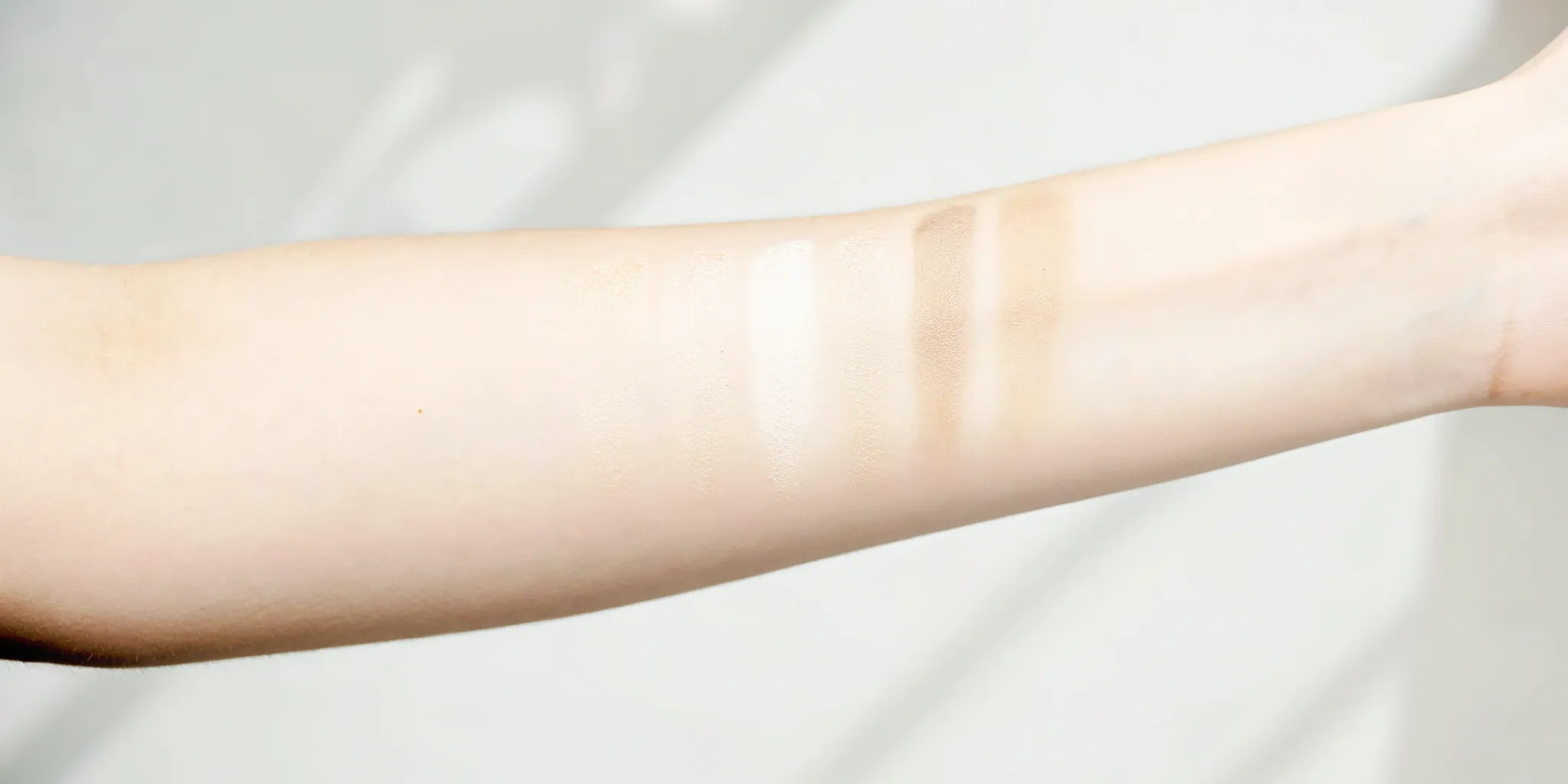 Tattoo removal before and after: Faded forearm tattoo.