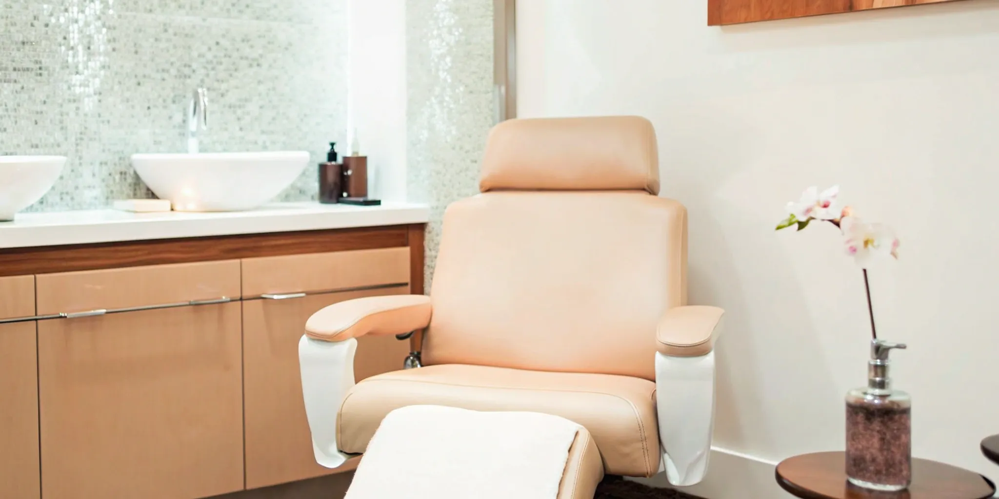 A comfortable treatment room prepared for an UltraShape fat reduction procedure.