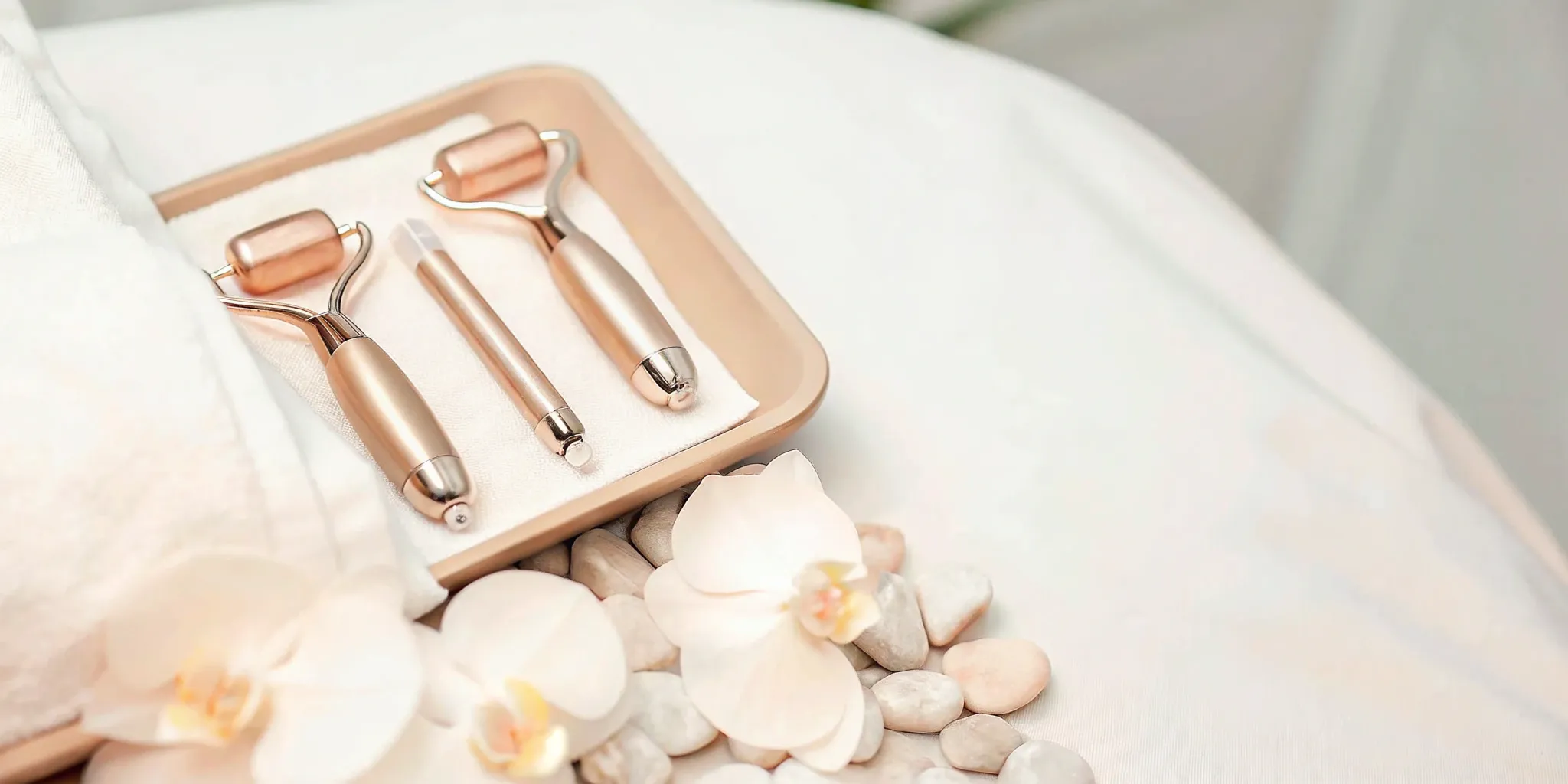 Microneedling pen with calming spa accessories.