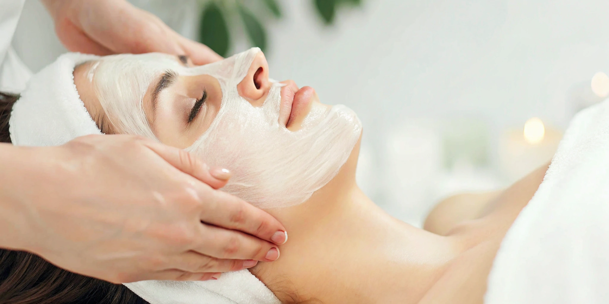 Aesthetician applying a VI Peel to a woman's face at a med spa in Dallas, TX.