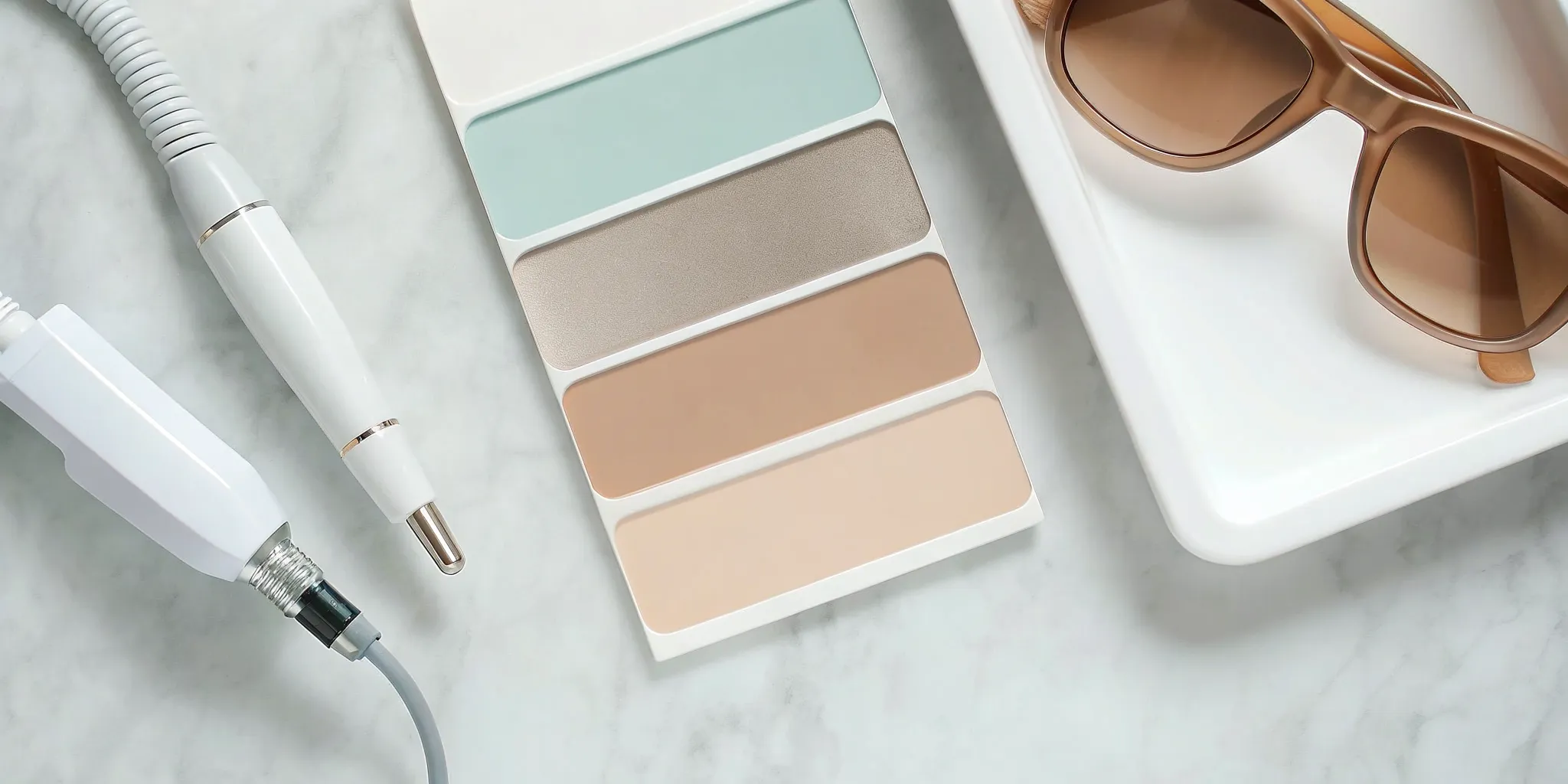 Laser hair removal equipment and skin tone chart used to determine treatment prices.