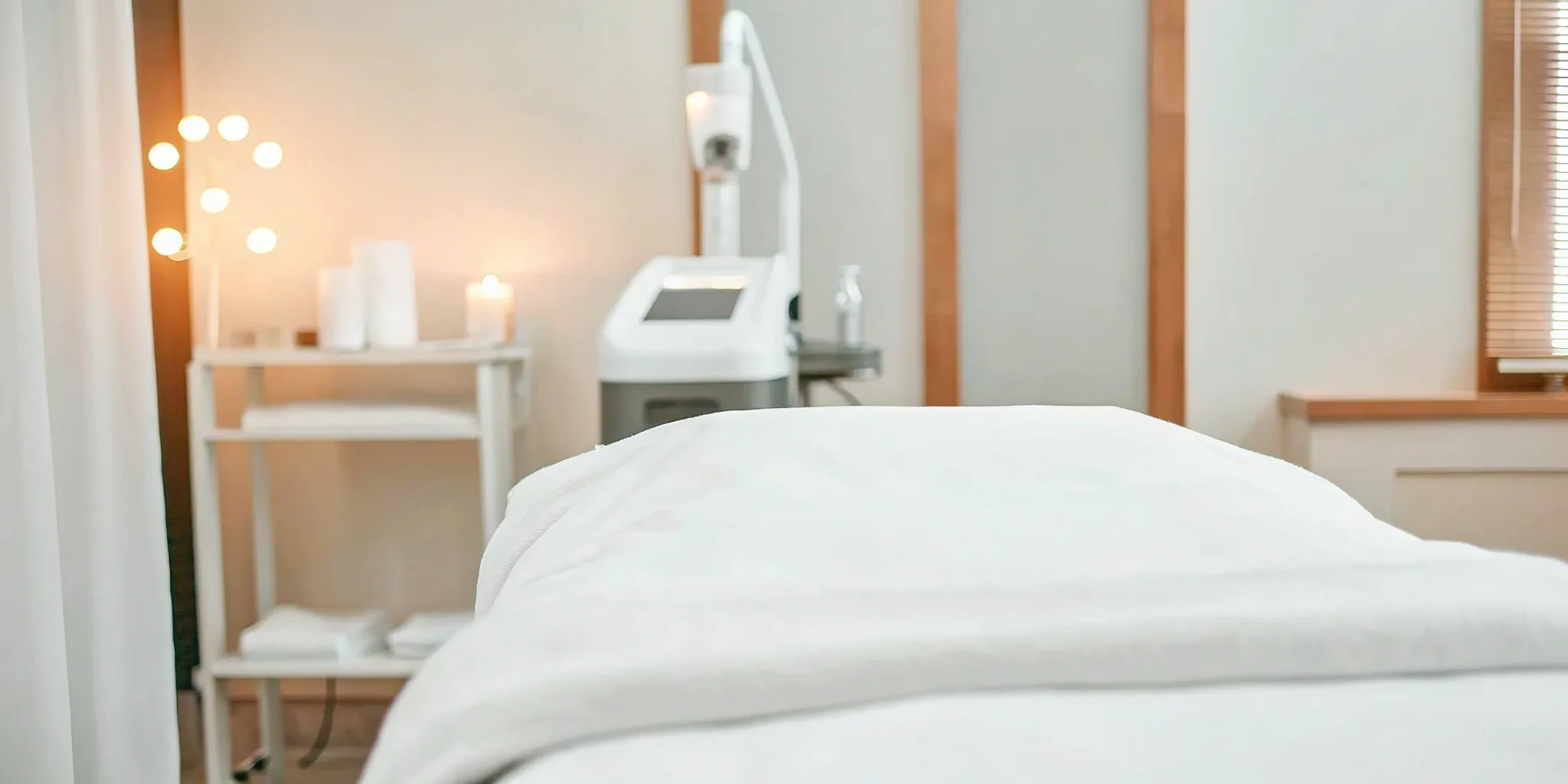 Woman receiving professional Brazilian laser hair removal treatment at Ultimate Image MedSpa