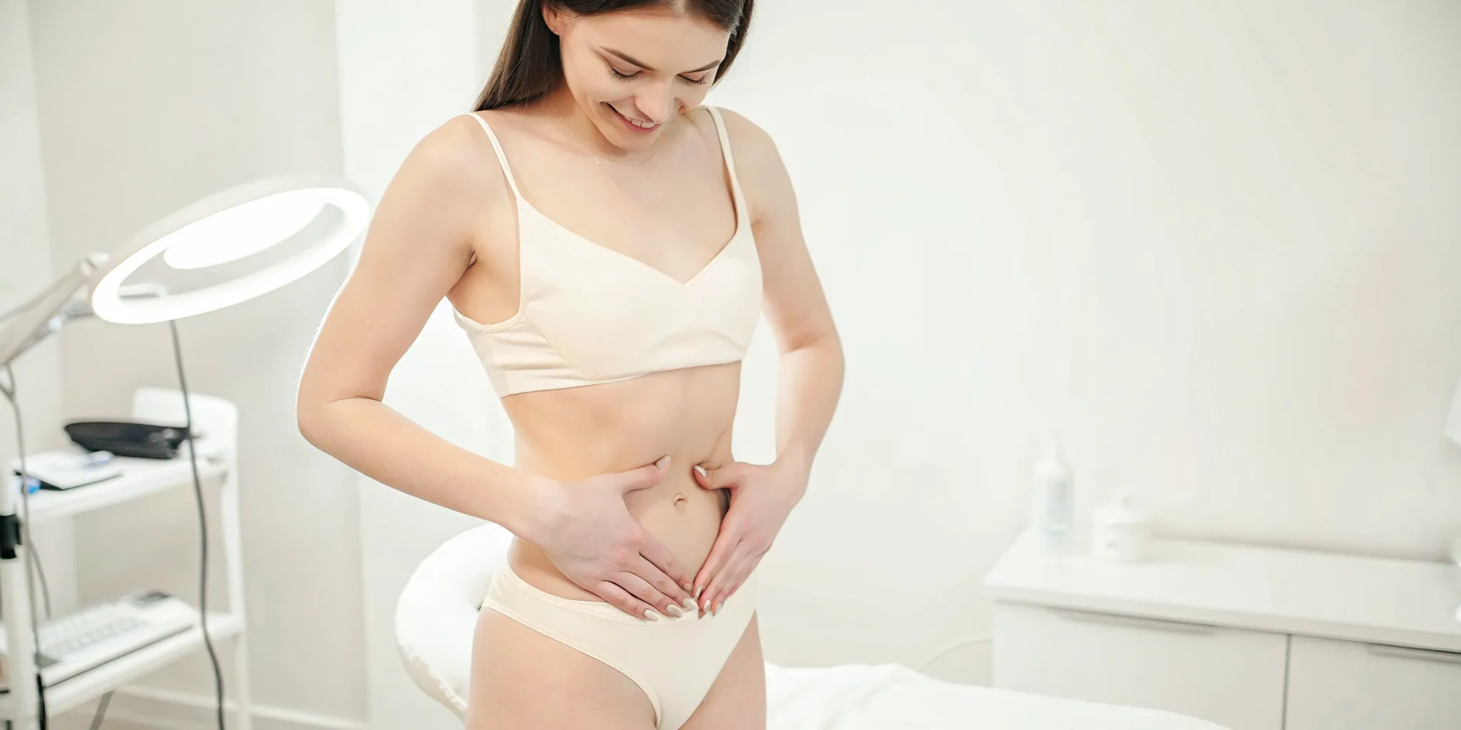 Woman during a body contouring consultation at a modern Dallas medical spa